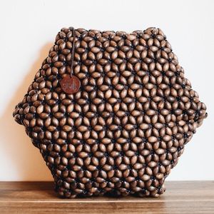 Wooden beaded pillow by The SAK
